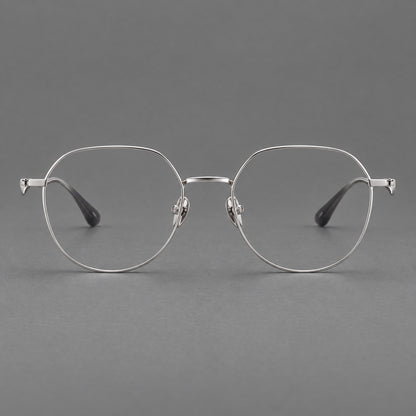 Rounded titanium glasses with a short bridge and distinctive wavy metal temples in Silver, front view additional product view