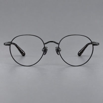 Retro panto titanium glasses with faceted corners and mottled curved temple tips in Black, front view side view