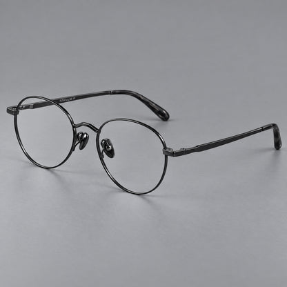Retro panto titanium glasses with faceted corners and mottled curved temple tips in Black, three quarter view