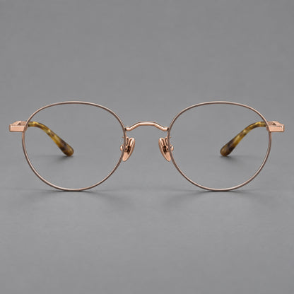 Retro panto titanium glasses with faceted corners and mottled curved temple tips in Grey Brown and Rose Gold, front view frame detail