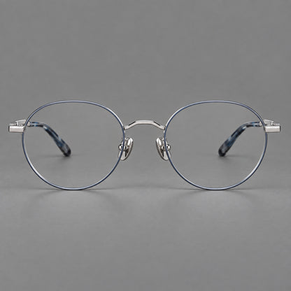 Retro panto titanium glasses with faceted corners and mottled curved temple tips in Grey Blue and Silver, front view temple detail