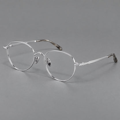 Retro panto titanium glasses with faceted corners and mottled curved temple tips in Silver, three quarter view additional product view