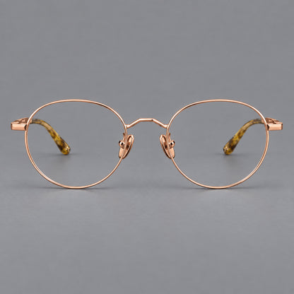 Retro panto titanium glasses with faceted corners and mottled curved temple tips in Rose Gold, front view additional product view