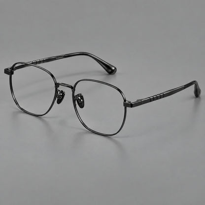 Soft square titanium glasses with a raised bridge and engraved temple bands in Black, three quarter view