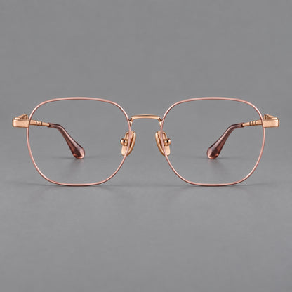 Soft square titanium glasses with a raised bridge and engraved temple bands in Pink and Rose Gold, front view temple detail