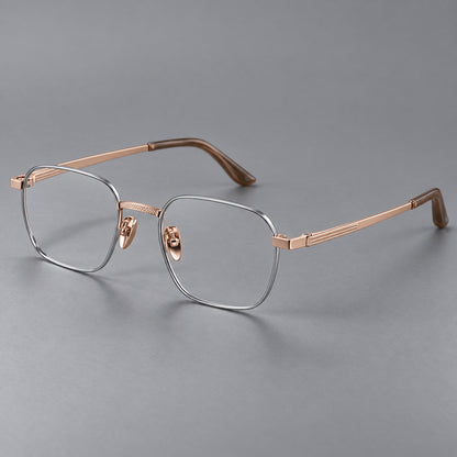 Geometric square titanium glasses with a textured bridge and fine temple grooves in Grey and Rose Gold, three quarter view front view