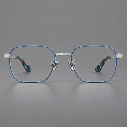 Geometric square titanium glasses with a textured bridge and fine temple grooves in Blue and Silver, front view temple detail