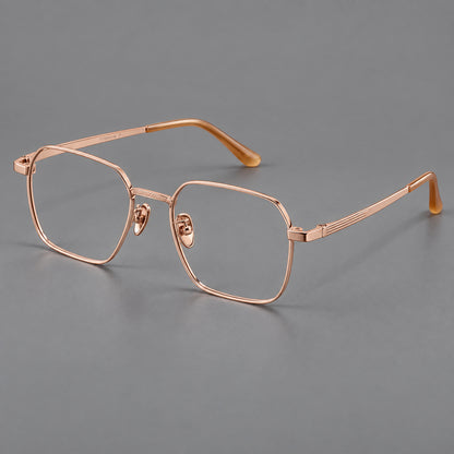Geometric square titanium glasses with a textured bridge and fine temple grooves in Rose Gold, three quarter view additional product view