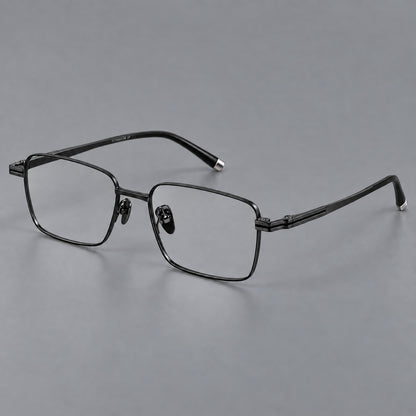 Rectangular titanium glasses with inset corner lines and metal capped temple tips in Black, three quarter view