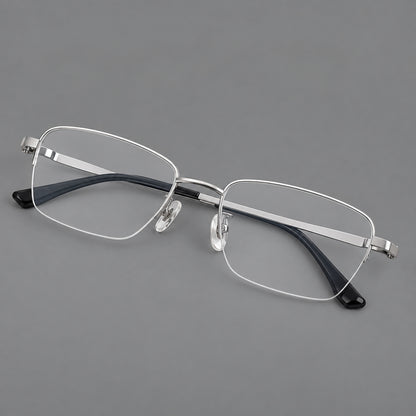 Half frame titanium glasses with rectangular lenses and rounded hinge details in Silver, three quarter view additional product view