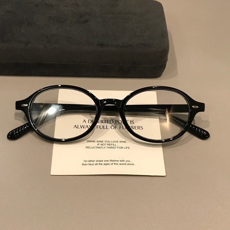 Retro Round Eyeglass Frames with Thick Rims and a Raised Bridge, Black - Black
