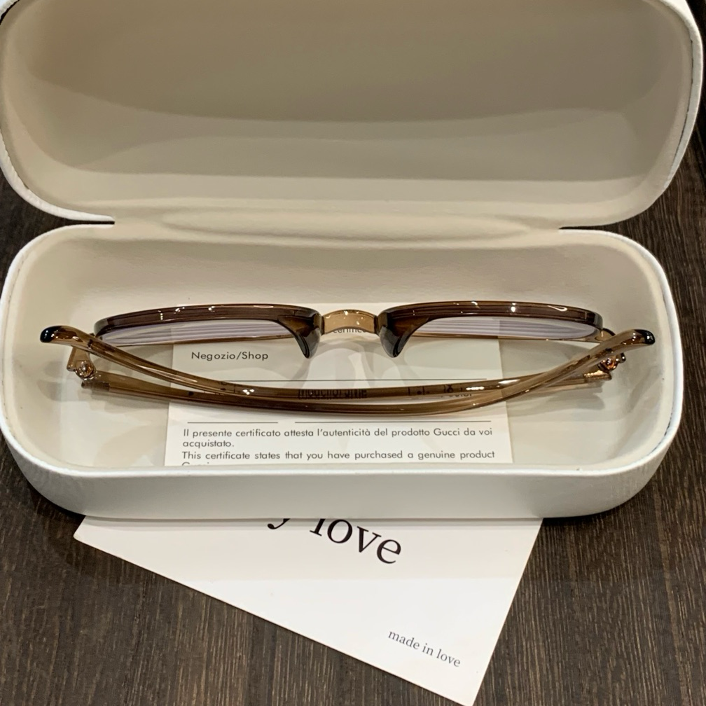 Round Eyeglass Frames with Thin Rims and a Curved Brow, Cool Tea Brown frame detail