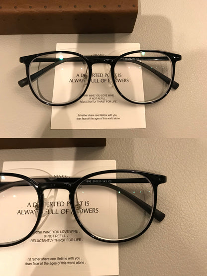Square Eyeglass Frames with Thin Rims and a Curved Bridge, Black side view
