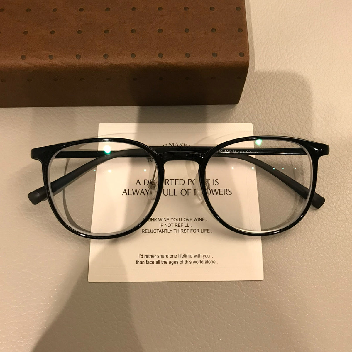 Square Eyeglass Frames with Thin Rims and a Curved Bridge, Black