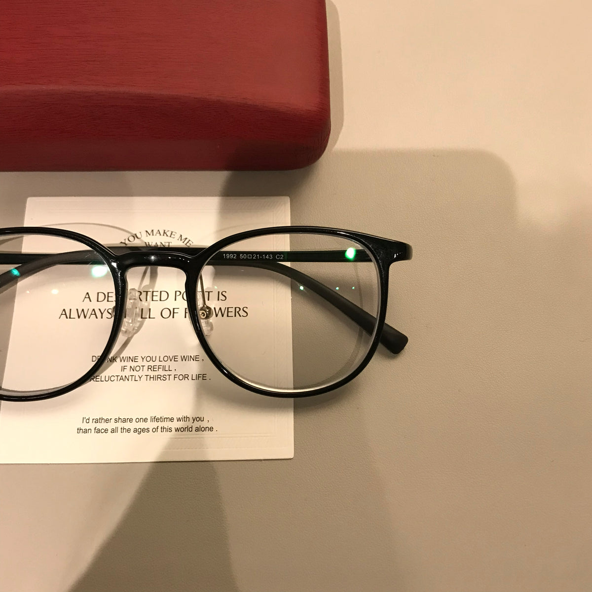 Square Eyeglass Frames with Thin Rims and a Curved Bridge, Black lens detail