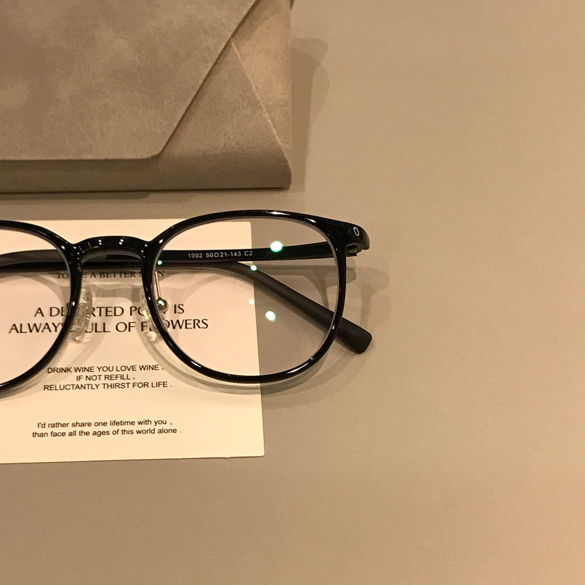 Square Eyeglass Frames with Thin Rims and a Curved Bridge, Black