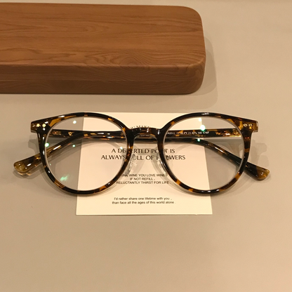 Round Eyeglass Frames with Rivet Accents, Amber Brown and More Colors front view