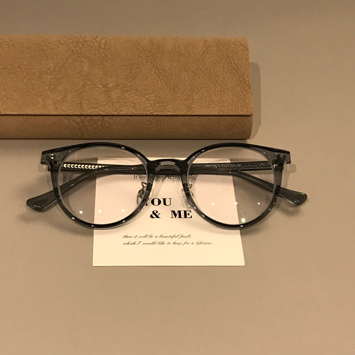 Round Eyeglass Frames with Rivet Accents, Amber Brown and More Colors - Transparent Blue Gray