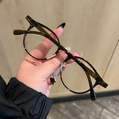 Rounded Cat-Eye Eyeglass Frames with Raised Outer Corners, Caramel Tea lens detail