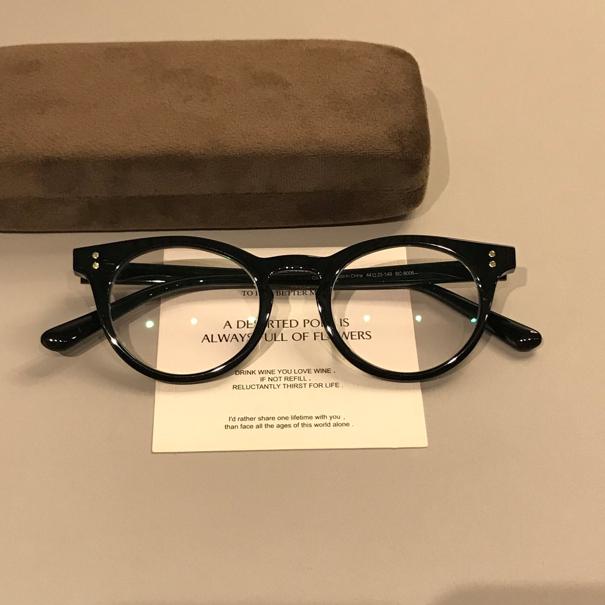 Compact Oval Eyeglass Frames with Thick Rims, Black or Tortoiseshell lens detail