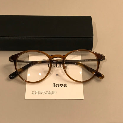 Compact Round Eyeglass Frames with Slim Temples, Black or Tortoiseshel frame detail