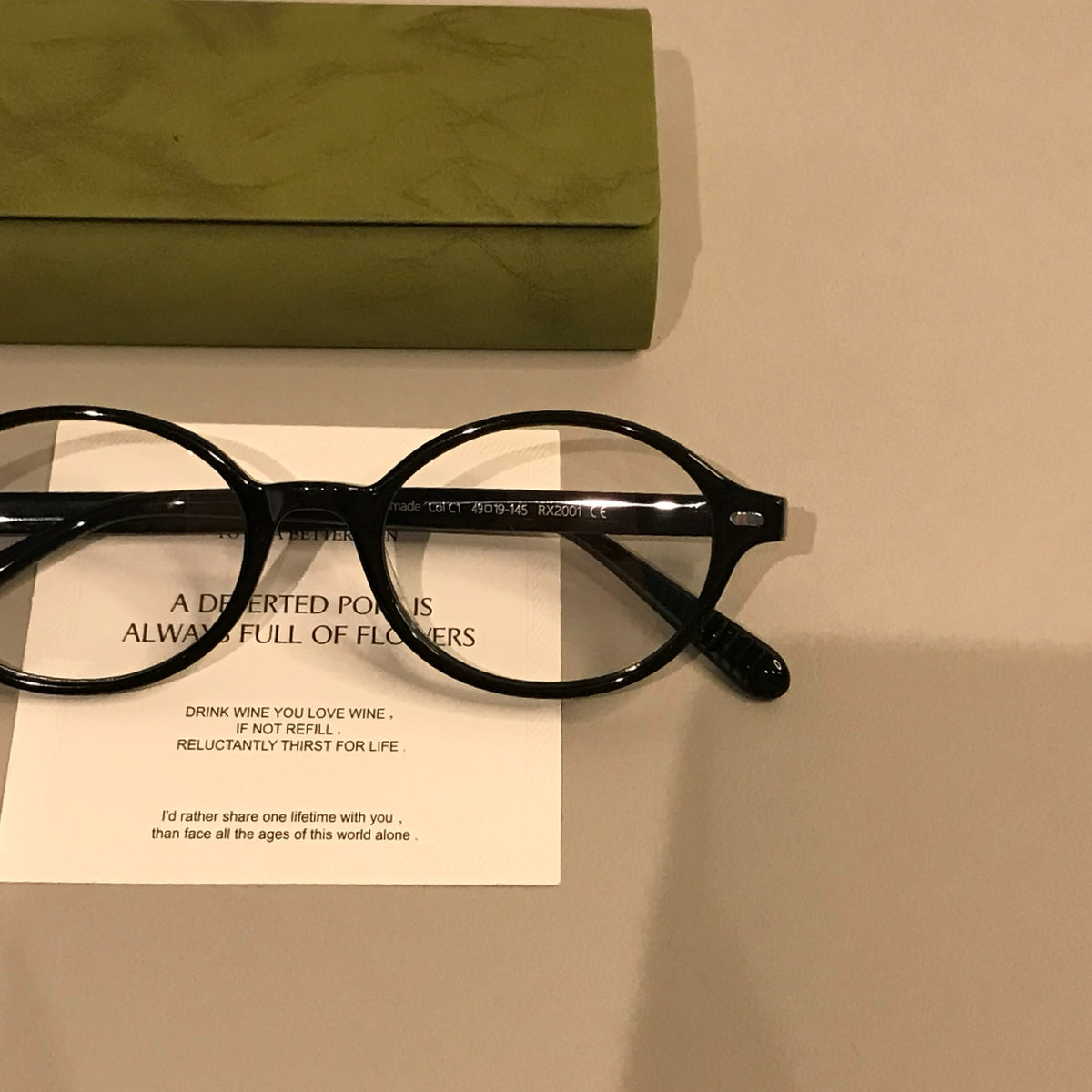 Retro Oval Eyeglass Frames with a Low-Profile Front, Black or Tortoise frame detail
