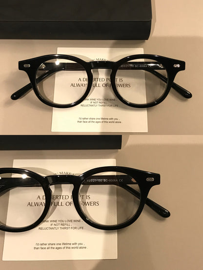 Retro Round Eyeglass Frames with a Broad Upper Rim, Tortoiseshell or G temple detail