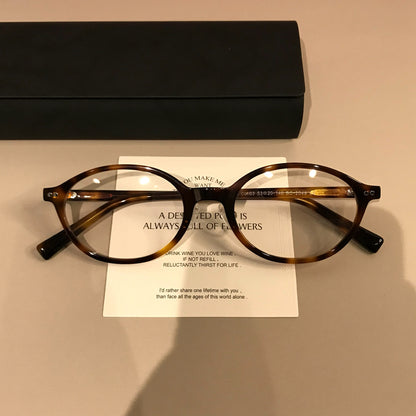 Wide Oval Eyeglass Frames with Thick Rims, Tortoiseshell frame detail
