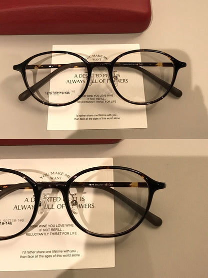 Round Eyeglass Frames with Broad Temples and Corner Studs, Black, Tort front view