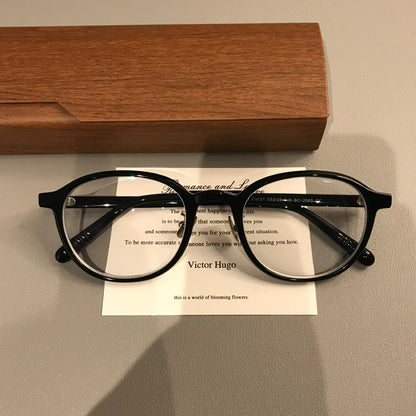 Oval Eyeglass Frames with a Thick Upper Rim, Black, Burgundy or Tortoi
